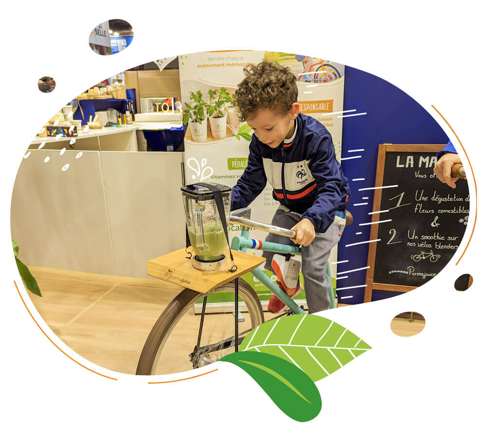 Enfant participant à une animation vélo smoothie