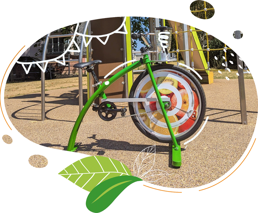 Vélo Smoothie Original Kids vert dans un parc pour enfant